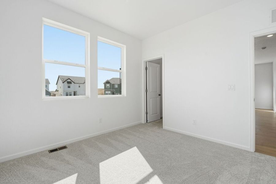 Spacious, unfurnished interior of a new home in Trailstone, Arvada (Image 22).