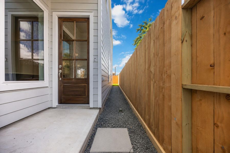Step through the majestic 8-foot wood and glass front door into a home where every detail is designed to flow seamlessly.
