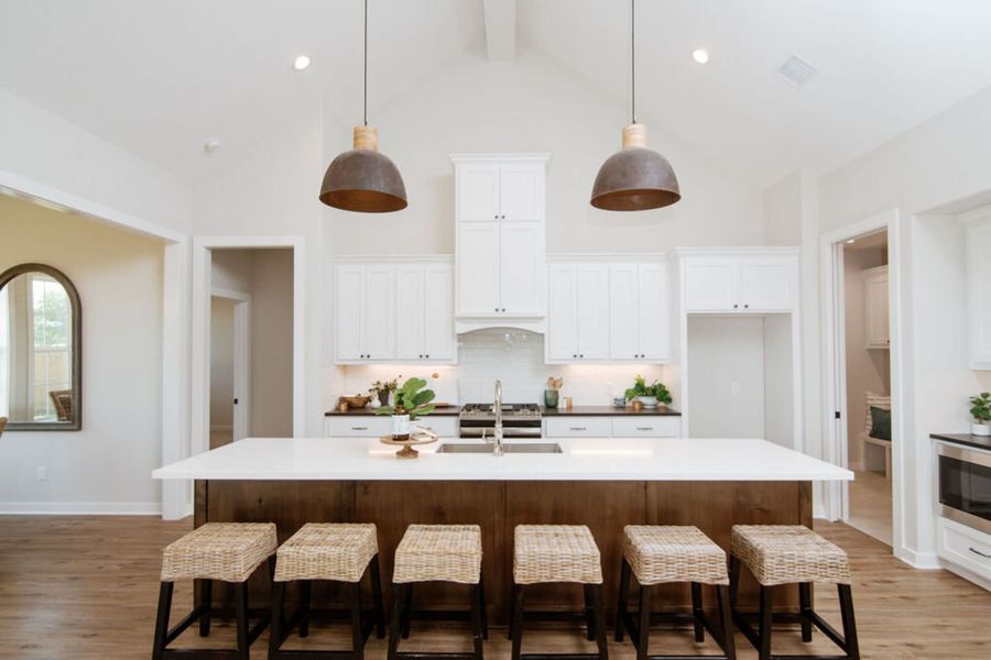 Representative furnished interior of a home built from the The Caroline by Reece Homes in Pebble Creek, College Station (Image 9).