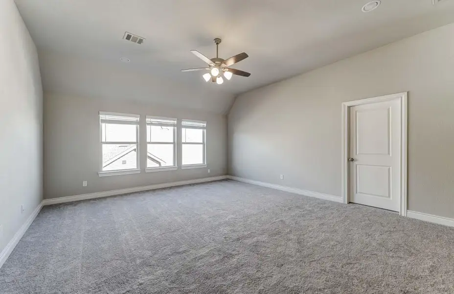 Representative unfurnished interior of a home built from the 3798 by Ravenna Homes in The Woodlands Hills 65′, Willis (Image 41).