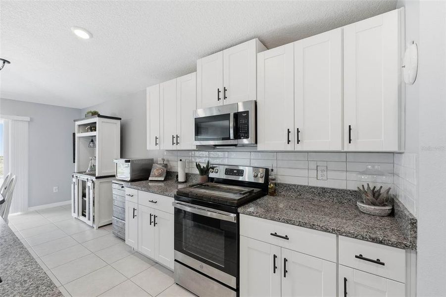 Furnished interior view inside a new home in Verano: The Estates, Spring Hill (Image 16). Furnished interior view inside a new home in Verano: The Estates, Spring Hill (Image 16).