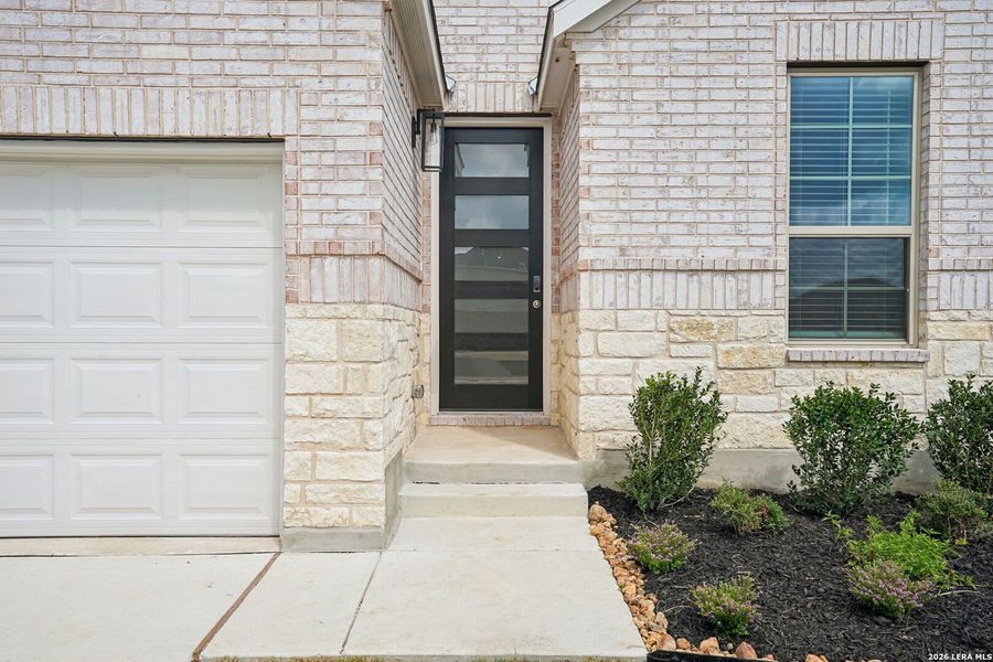 Exterior details and patio area of a home in Kallison Ranch, San Antonio (Image 26).