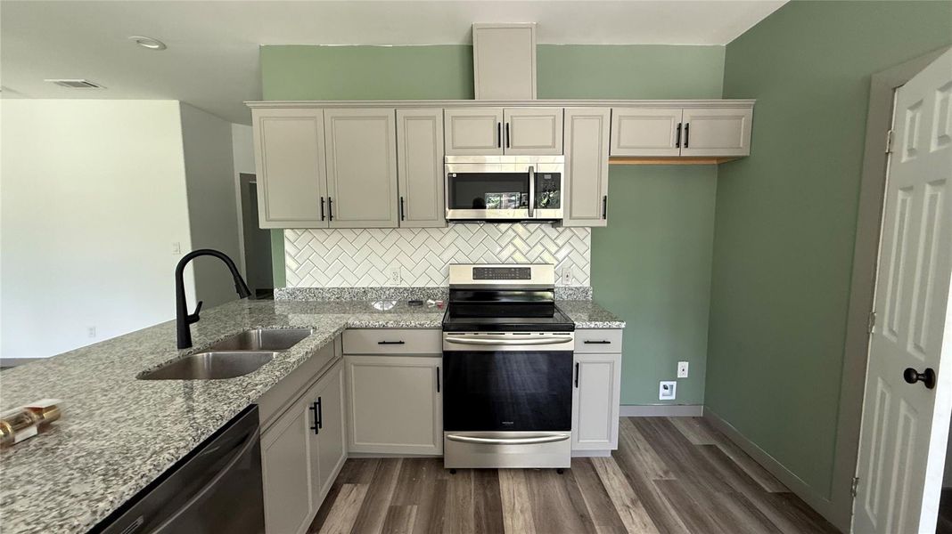 Furnished interior view inside a new home in , Conroe (Image 8).