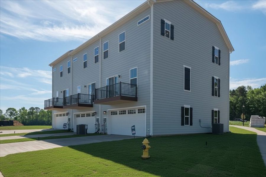 Exterior details and patio area of a home in Stowe Branch Townhomes, Charlotte (Image 2).