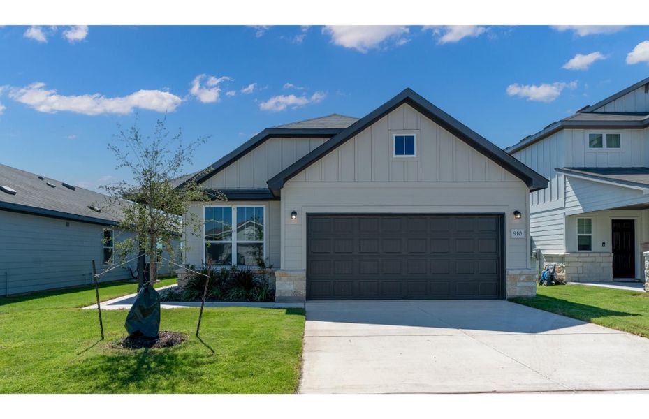 Front exterior of a new home in River Ranch, Dayton, TX, highlighting curb appeal (Image 1). Front exterior of a new home in River Ranch, Dayton, TX, highlighting curb appeal (Image 1).