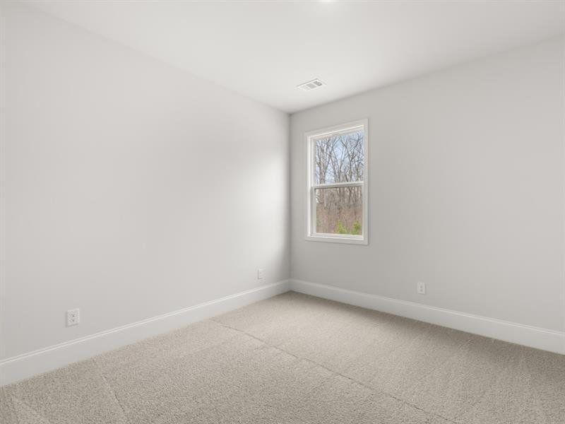 Spacious, unfurnished interior of a new home in Butner Estates, South Fulton (Image 37).