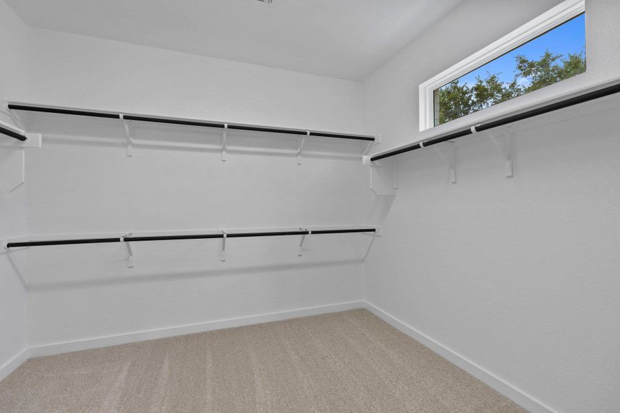 Walk-in closet in Primary Bedroom