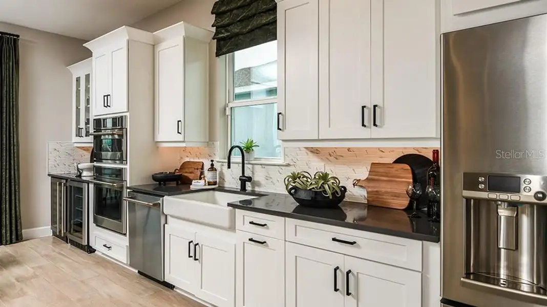 Furnished interior view inside a new home in Esplanade at Westview, Kissimmee (Image 10). Furnished interior view inside a new home in Esplanade at Westview, Kissimmee (Image 10).