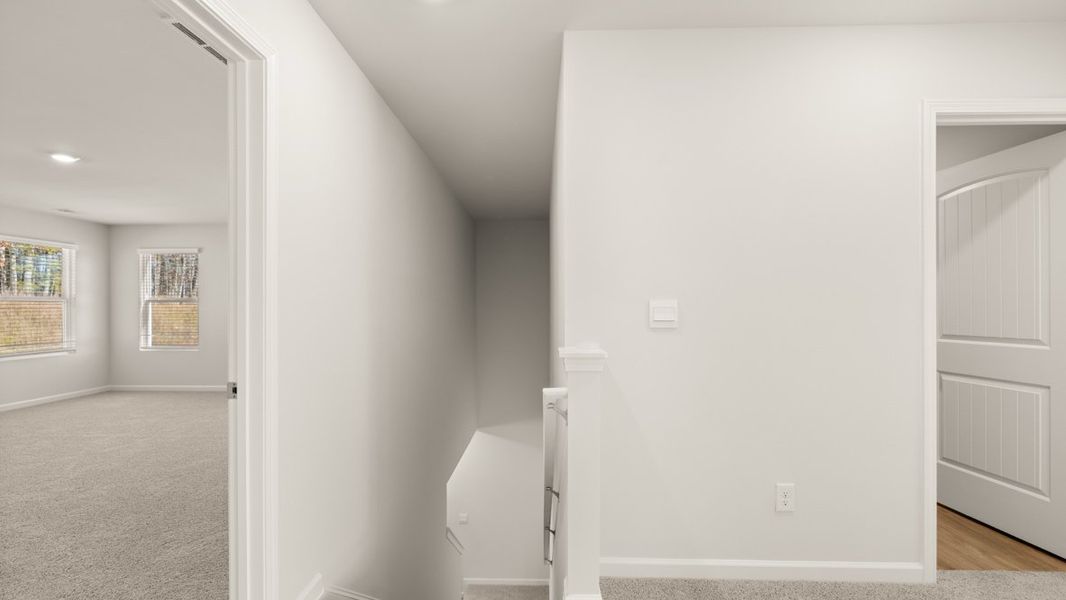 Representative unfurnished interior of a home built from the Mansfield by D.R. Horton in Northwoods at Mirror Lake, Villa Rica (Image 27). Representative unfurnished interior of a home built from the Mansfield by D.R. Horton in Northwoods at Mirror Lake, Villa Rica (Image 27).