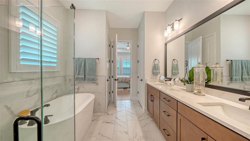 Furnished interior view inside a new home in Emerald Landing at Waterside at Lakewood Ranch – Lake Series, Sarasota (Image 35).