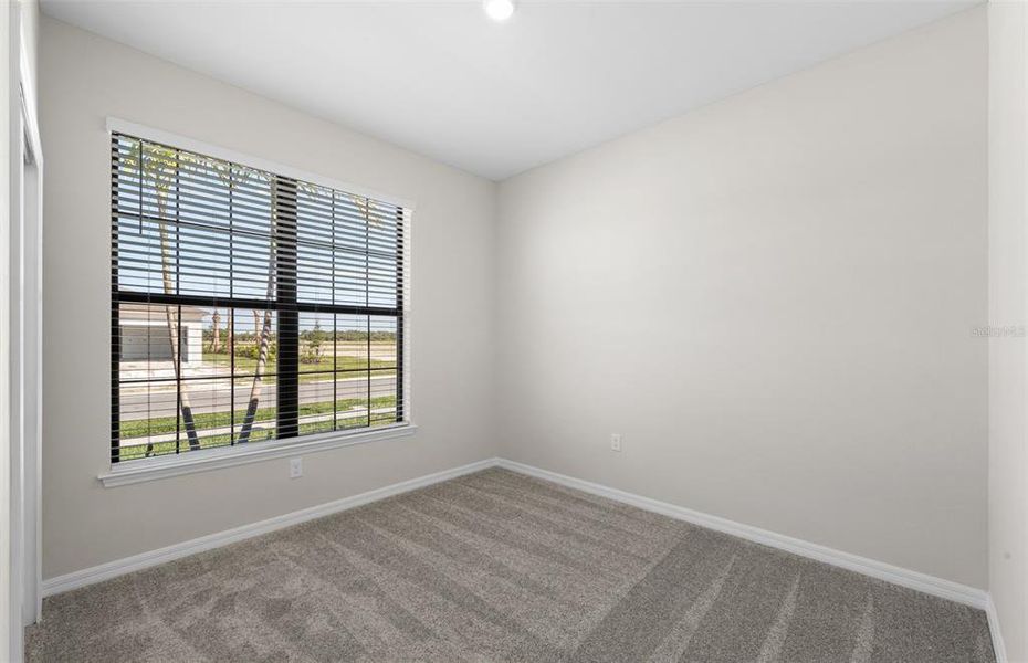 Spacious, unfurnished interior of a new home in The Strand at Cedar Grove, North Port (Image 22).