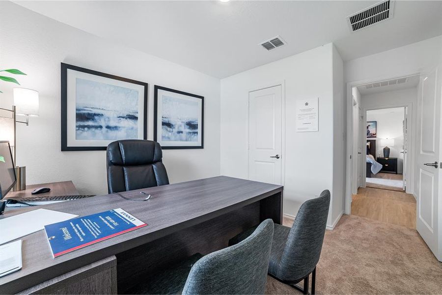 Office with light carpet Office with light carpet