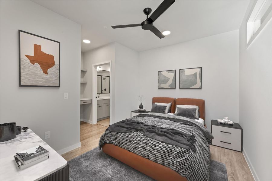 Bedroom featuring light wood finished floors, baseboards, recessed lighting, and a ceiling fan