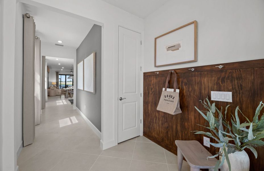 Inviting foyer with storage closet