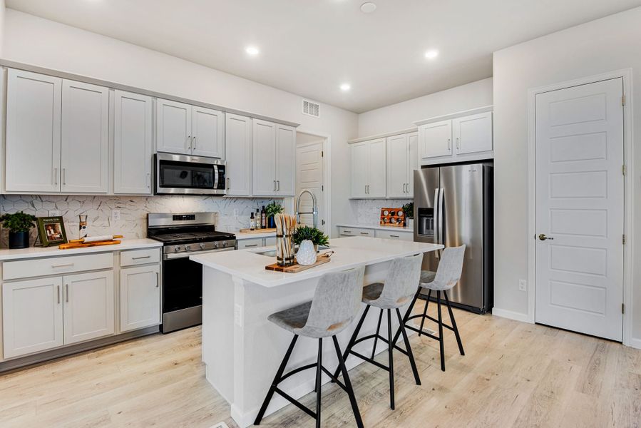 Representative furnished interior of a home built from the 3405 by Tri Pointe Homes in Westside Crossing, Berthoud (Image 32).