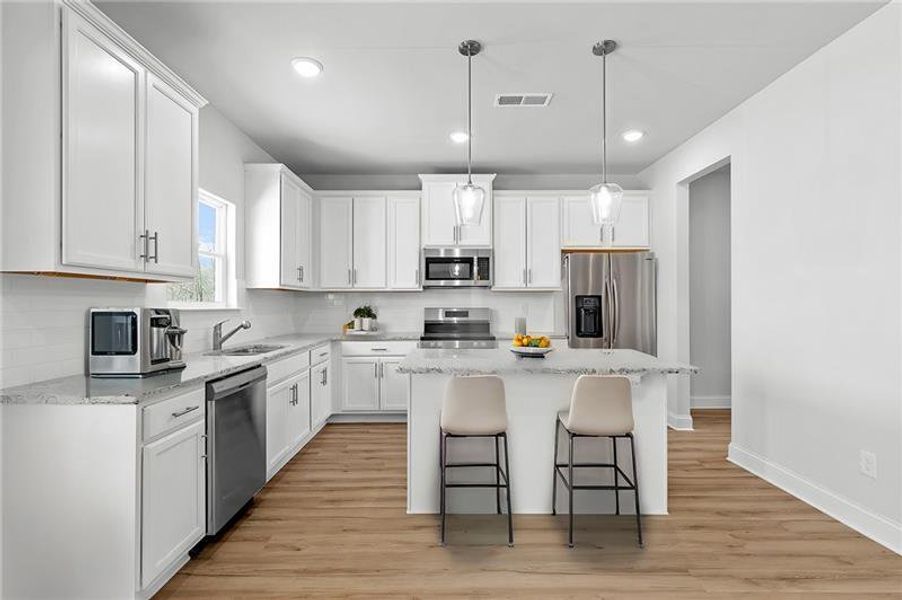 Furnished interior view inside a new home in , Homer (Image 11). Furnished interior view inside a new home in , Homer (Image 11).