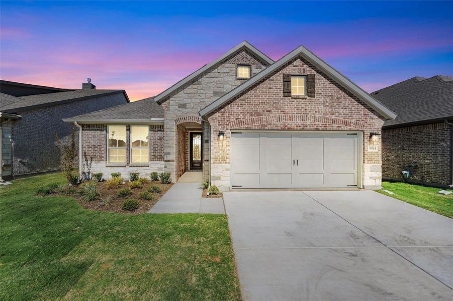 Front exterior of a new home in Morningstar, Aledo, TX, highlighting curb appeal (Image 2).