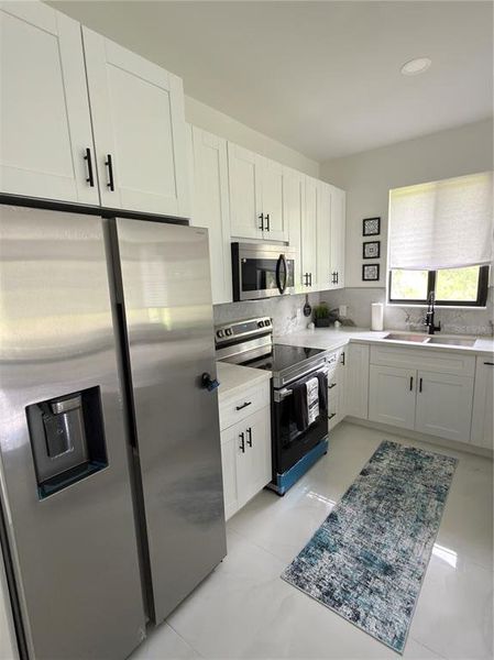 Furnished interior view inside a new home in , Lehigh Acres (Image 12).