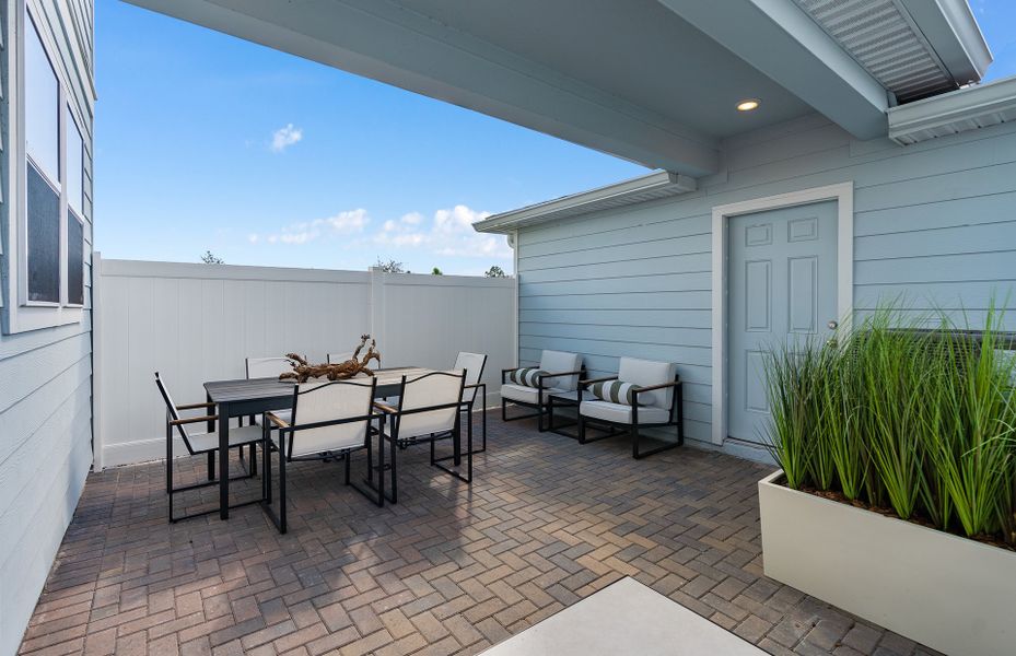 Exterior details and patio area of a home in EverBe, Orlando (Image 2). Exterior details and patio area of a home in EverBe, Orlando (Image 2).