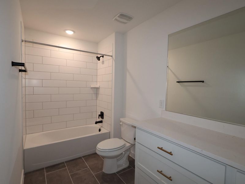 Furnished interior view inside a new home in Edgewood, Leander (Image 6). Furnished interior view inside a new home in Edgewood, Leander (Image 6).