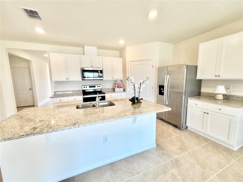 Furnished interior view inside a new home in Cascades, Davenport (Image 10).