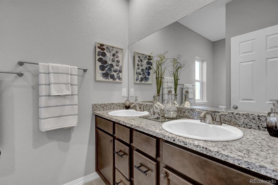 Double sink vanity will have undermount sinks, quartz counters, and shaker style cabinet doors Double sink vanity will have undermount sinks, quartz counters, and shaker style cabinet doors