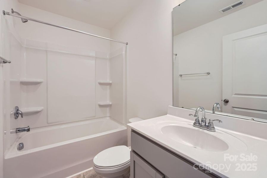Furnished interior view inside a new home in Dukes Ridge, Charlotte (Image 8).