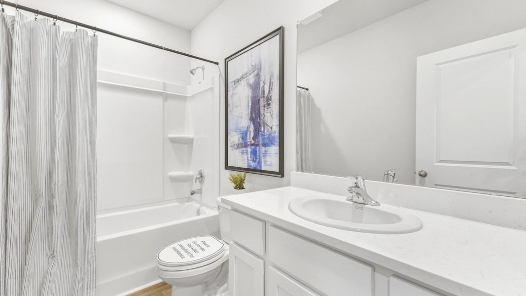 Furnished interior view inside a new home in The Gardens at Bay Street, Sarasota (Image 15).