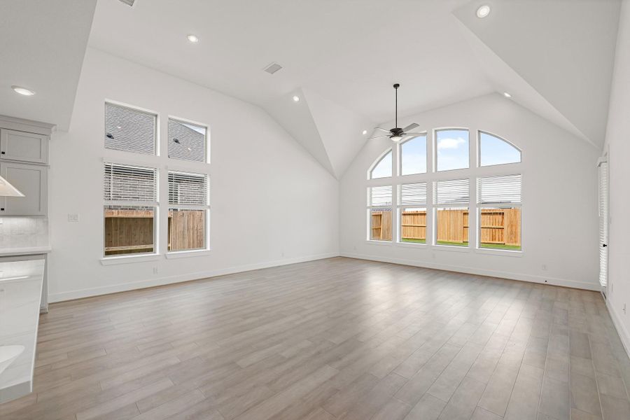 Elegant Arch Vaulted Family Room Windows Showcase Expansive Views