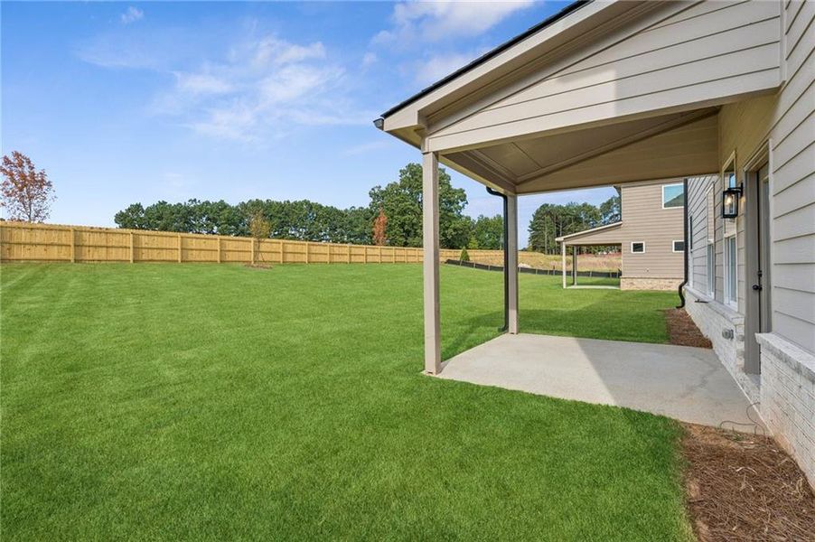 Front exterior of a new home in , Lawrenceville, GA, highlighting curb appeal (Image 26).