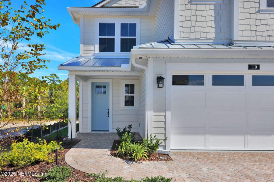 Front exterior of a new home in , Ponte Vedra, FL, highlighting curb appeal (Image 25).
