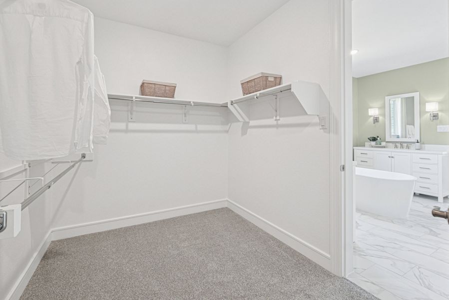 Primary Walk-in Closet Primary Walk-in Closet