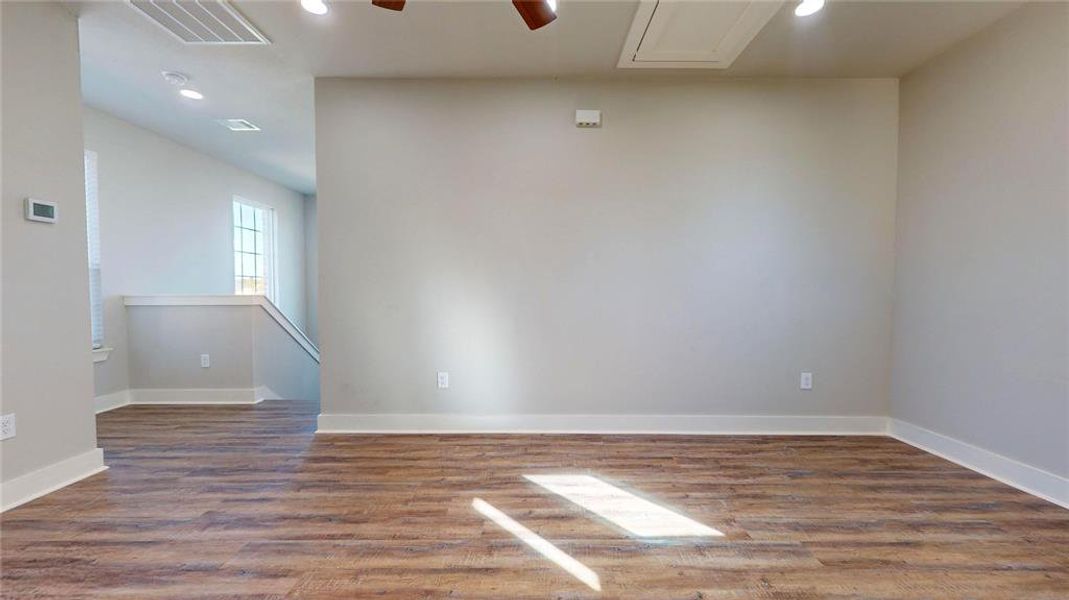 At the top of the stairs is the game room.