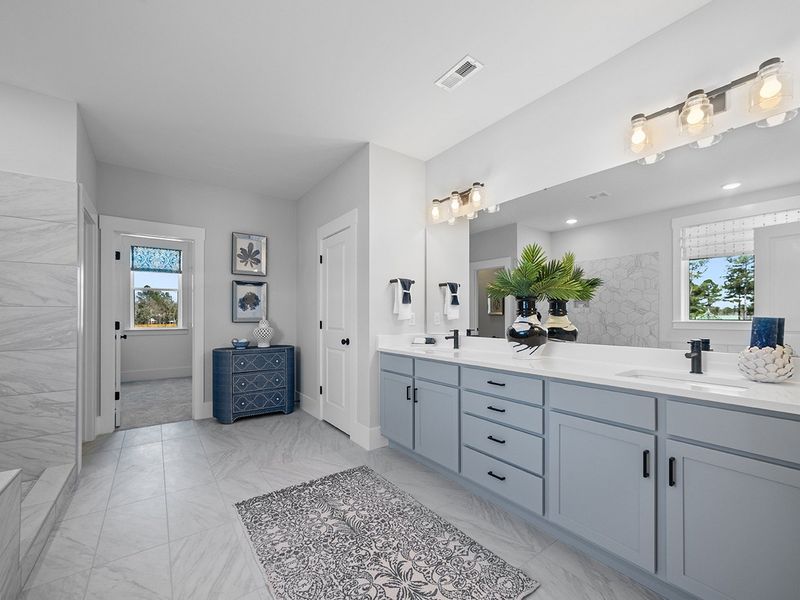 Representative furnished interior of a home built from the The Hampton by RobuckHomes in Windwater, Hampstead (Image 7).