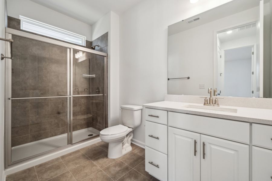 Representative furnished interior of a home built from the Madison Premier by Taylor Morrison in Stafford at Langtree, Mooresville (Image 17).