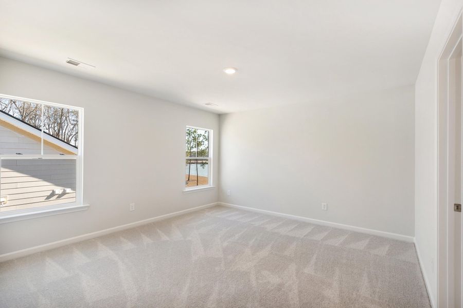 Spacious, unfurnished interior of a new home in Sweetgrass at Summers Corner, Summerville (Image 10).