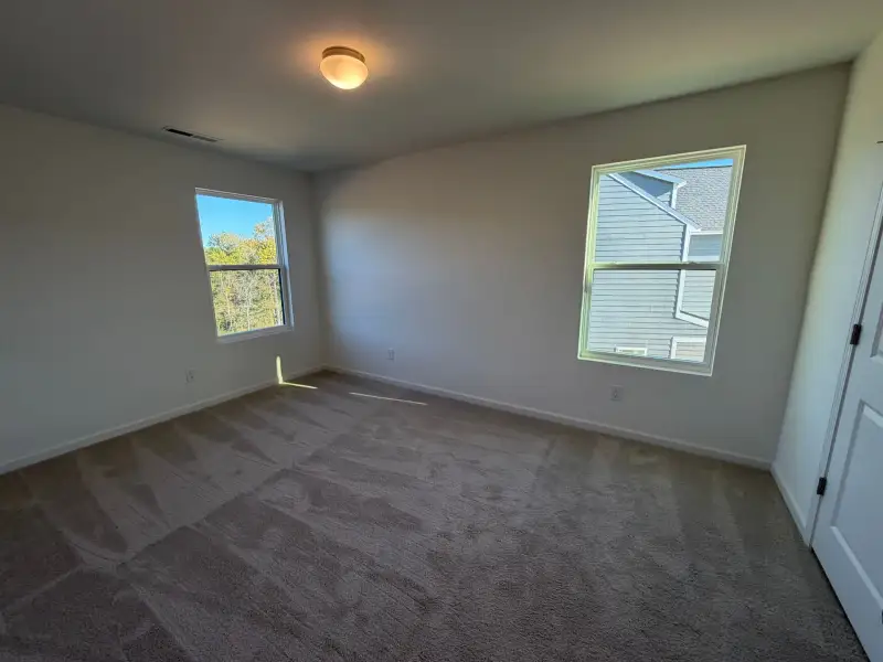 Spacious, unfurnished interior of a new home in Harris Place, Mooresville (Image 19).