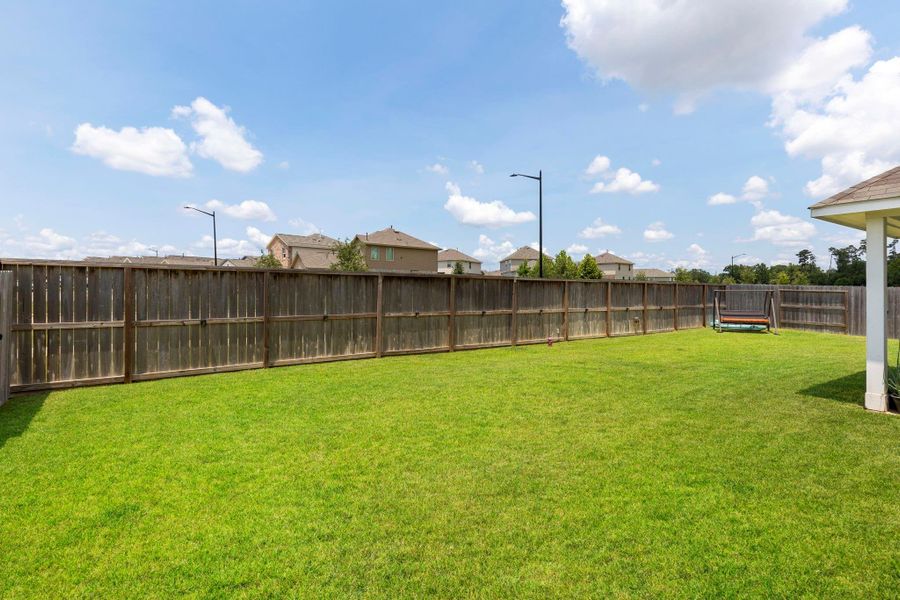 Front exterior of a new home in Moran Ranch, Willis, TX, highlighting curb appeal (Image 2). Front exterior of a new home in Moran Ranch, Willis, TX, highlighting curb appeal (Image 2).
