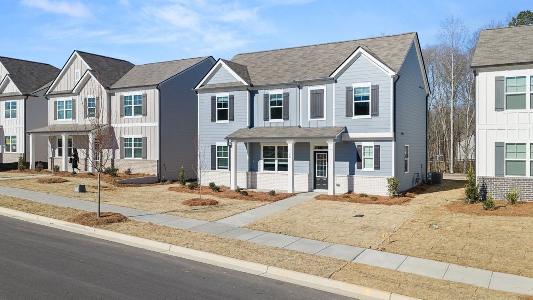 Representative exterior photo of a completed home built from the Carroll ll by D.R. Horton in Braselton Village, Braselton, GA (Image 14).