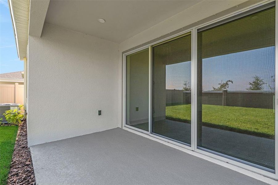 Exterior details and patio area of a home in Seaire, Parrish (Image 4). Exterior details and patio area of a home in Seaire, Parrish (Image 4).