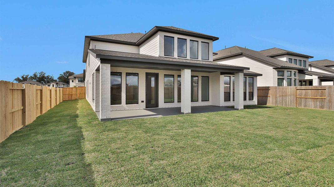 Exterior details and patio area of a home in Sienna 55' - Valencia, Missouri City (Image 2). Exterior details and patio area of a home in Sienna 55' - Valencia, Missouri City (Image 2).