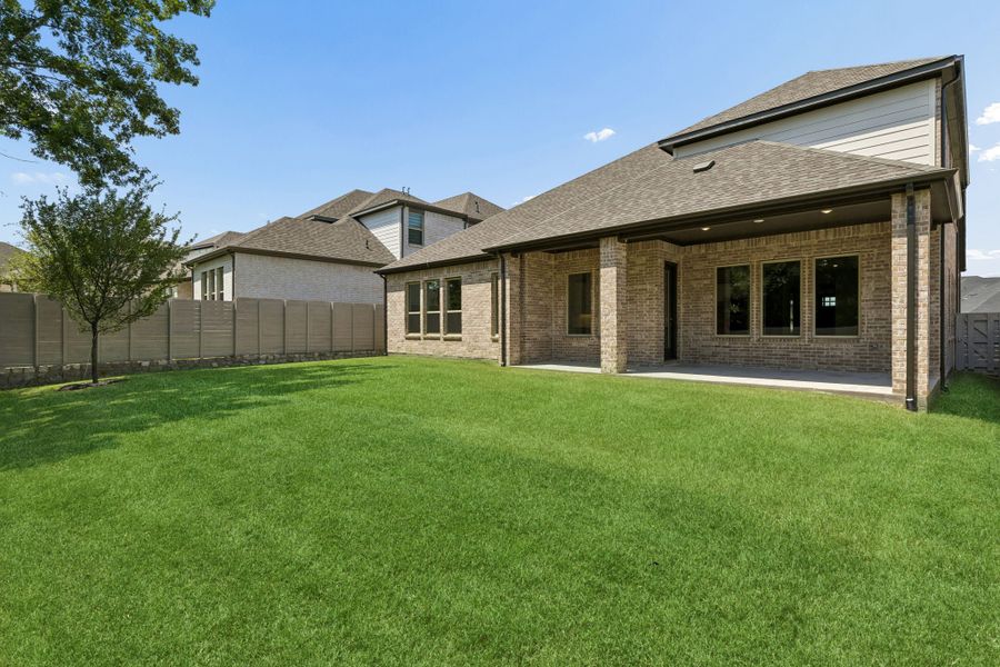 Exterior details and patio area of a home in Painted Tree Lakeside, McKinney (Image 4).