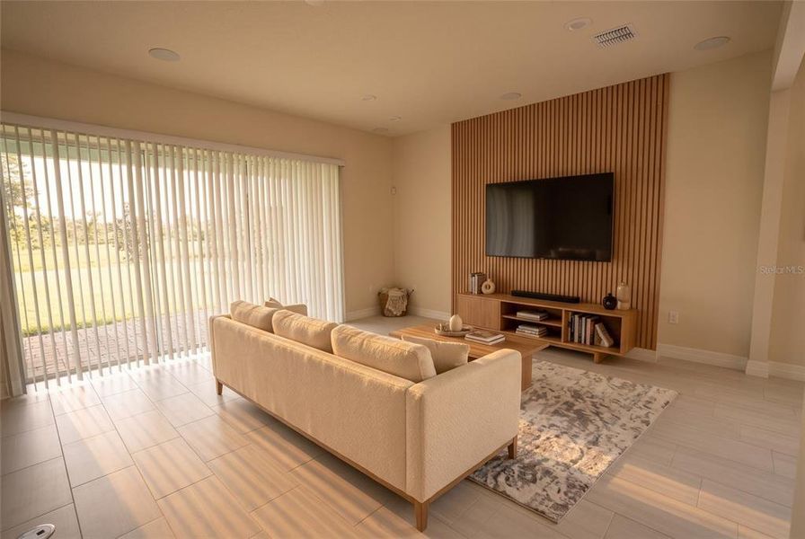 Furnished interior view inside a new home in Parkview Reserve, Orlando (Image 7).