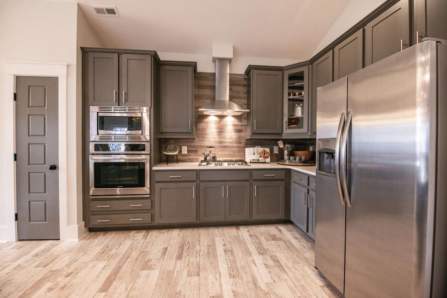 Representative furnished interior of a home built from the Helmsley by Bill Clark Homes in The Sanctuary at Sunset Beach, Sunset Beach (Image 13). Representative furnished interior of a home built from the Helmsley by Bill Clark Homes in The Sanctuary at Sunset Beach, Sunset Beach (Image 13).