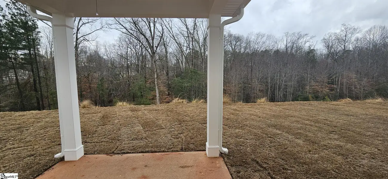 Exterior details and patio area of a home in Sedona, Greenville (Image 2).