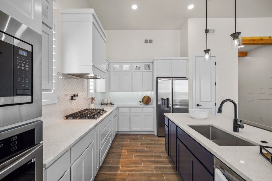 Representative furnished interior of a home built from the Escondido by LEH. Homes in Verdancia, El Paso (Image 49).