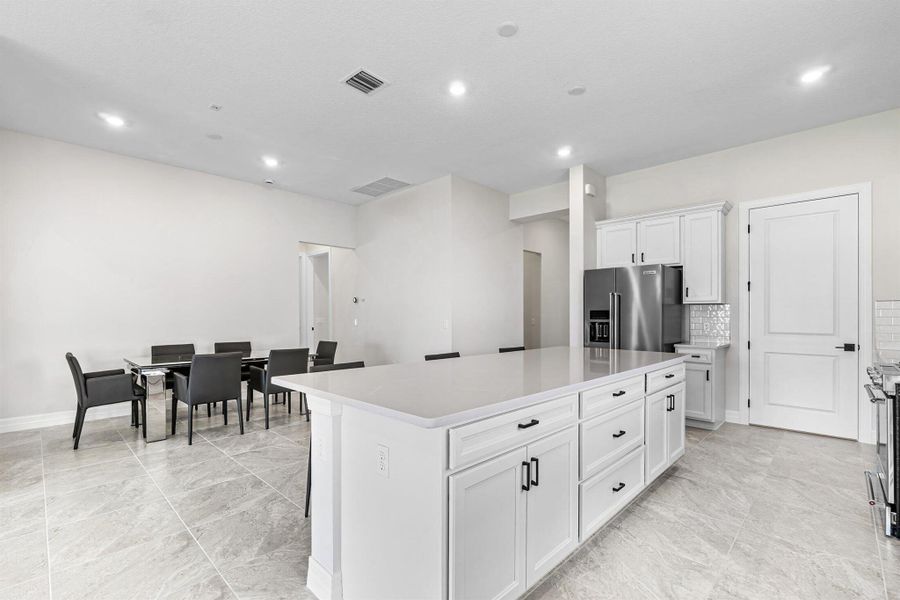 Furnished interior view inside a new home in Avondale at Avenir, Palm Beach Gardens (Image 47).