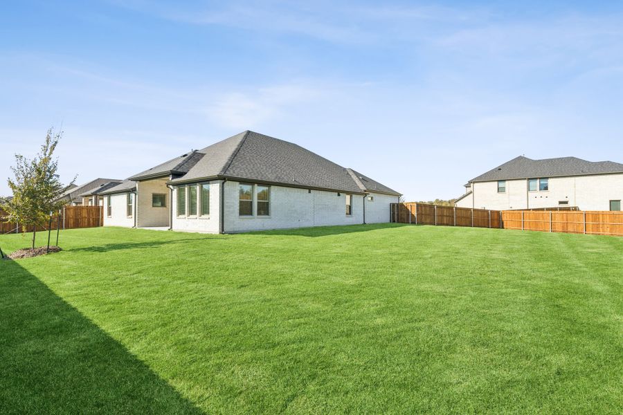 Covered Patio in the Gilmour II home plan by Trophy Signature Homes – REPRESENTATIVE PHOTO