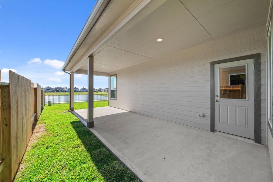 Exterior details and patio area of a home in Grand Oaks Village, Houston (Image 3).