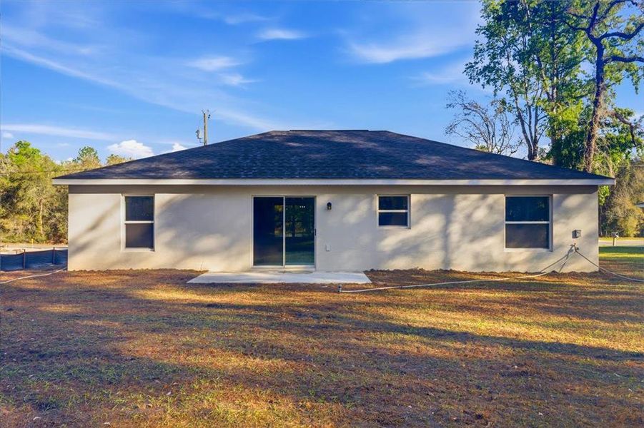 Exterior details and patio area of a home in , Citrus Springs (Image 3).